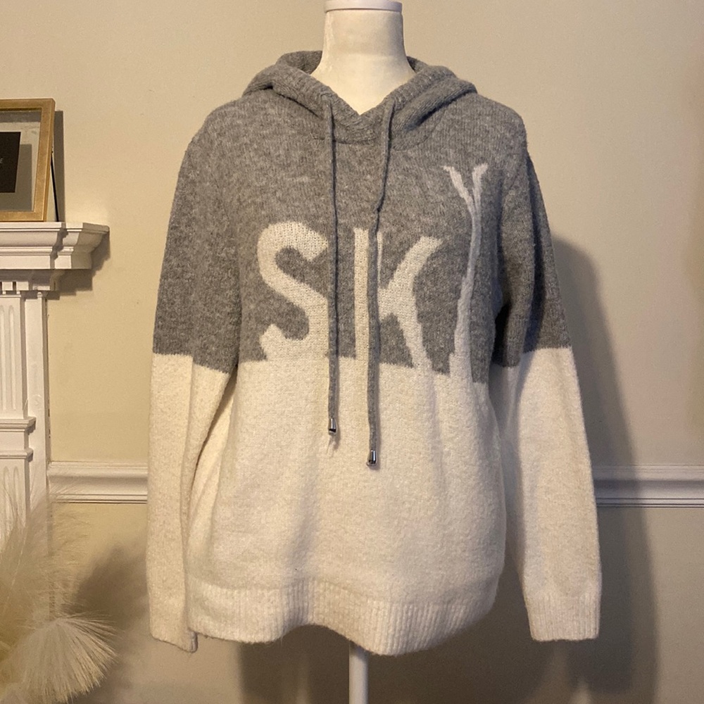 Size small Cupcakes and cashmere white and grey hooded sweater.